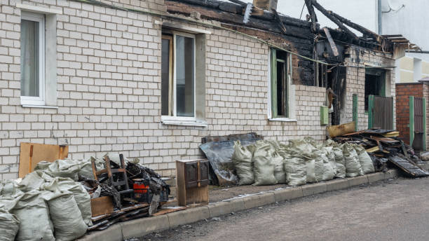 Professional Emergency Fire Cleanup technician working in Carrollton, KY